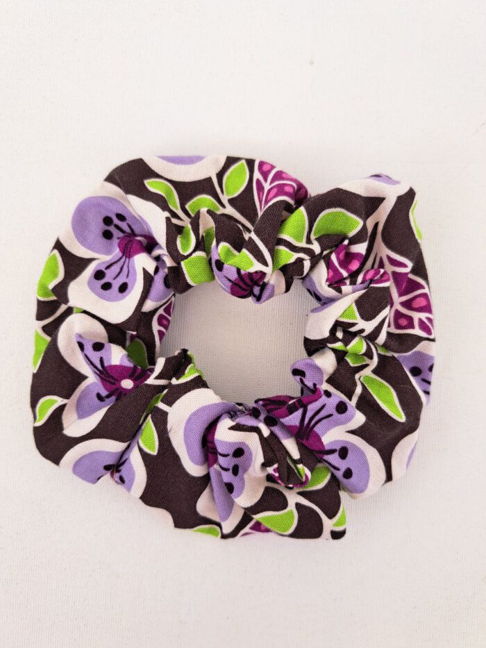 Coletero flores lilas